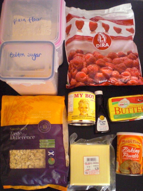 Ingredients for raspberry, white chocolate and oat cookies