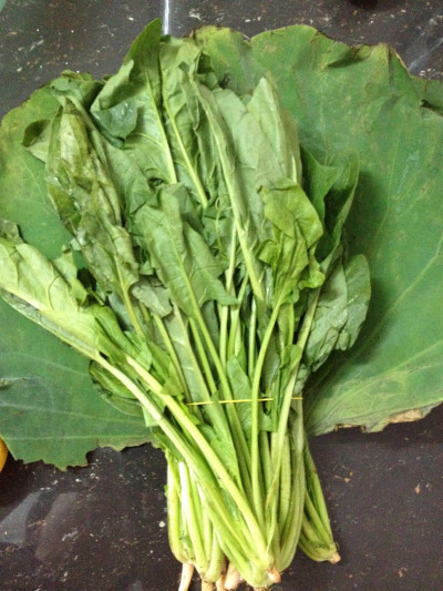 Spinach wrapped in a banana leaf