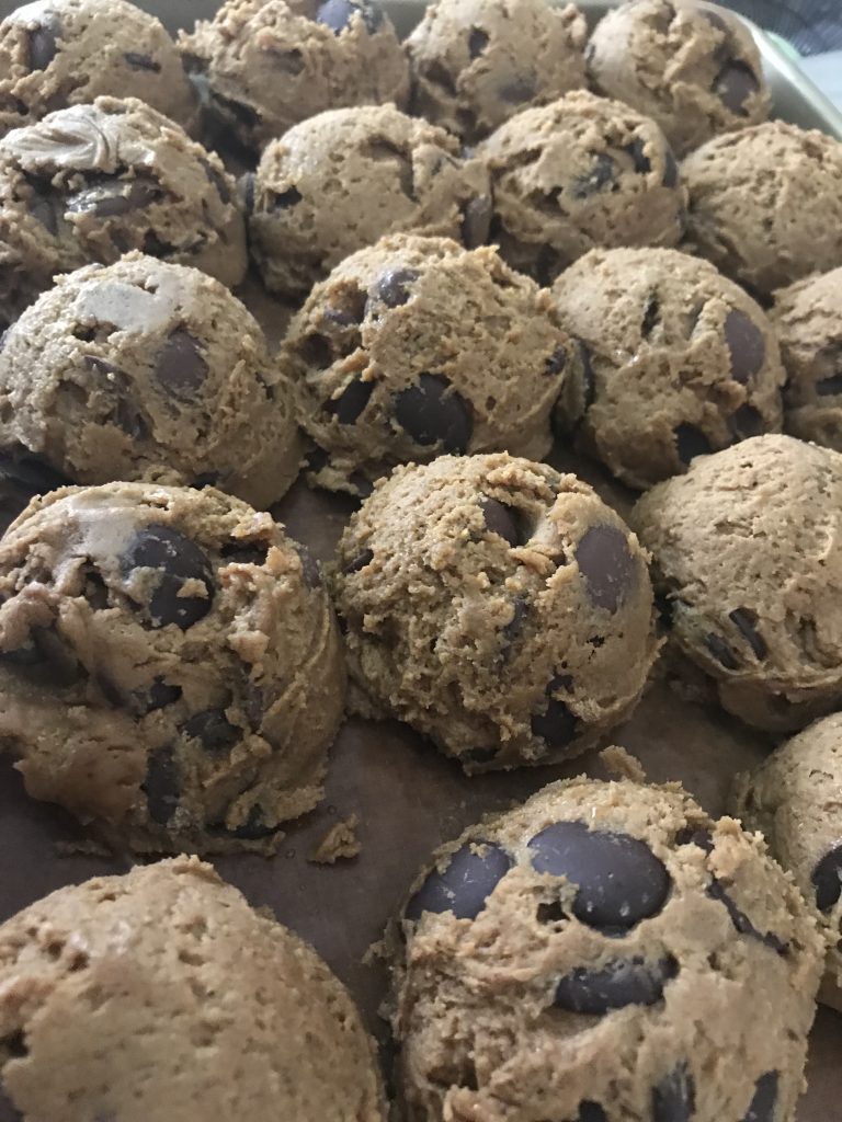 cookie dough scooped out into uniform balls
