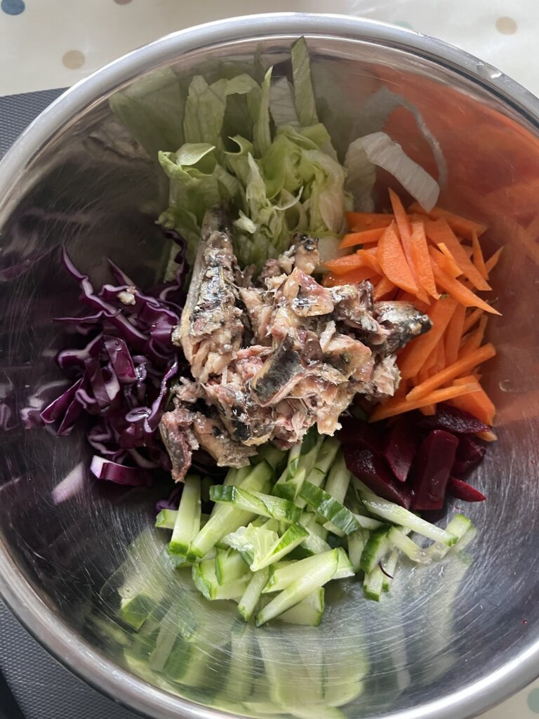 vegetables and sardine in a bowl
